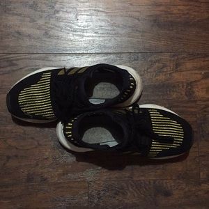 semi-used black/gold striped adidas <$=NEGOTIABLE>